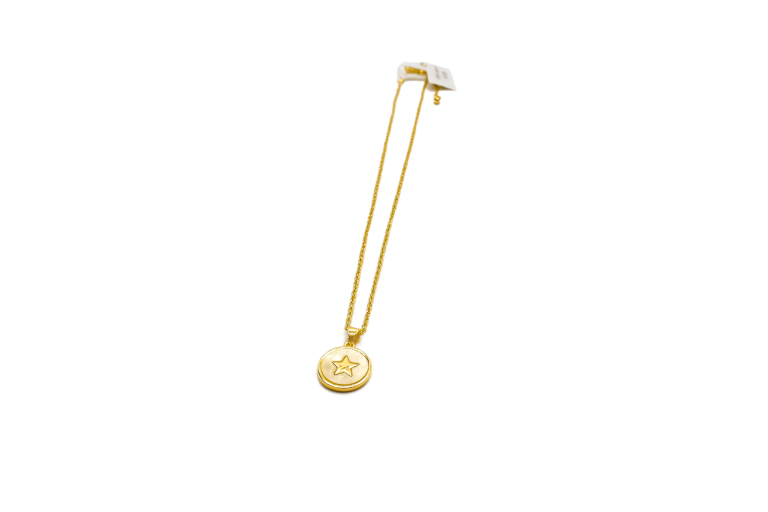 Gold star pendant